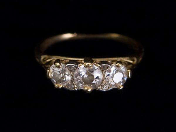 A Gold Three Stone Diamond Dress Ring