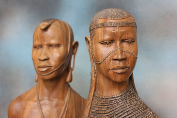 A Pair of Carved Himanthi Heads.