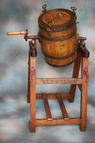 A Coopered Oak Butter Churn.