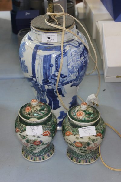 Pair of Small Famille Vert Vases and Covers.