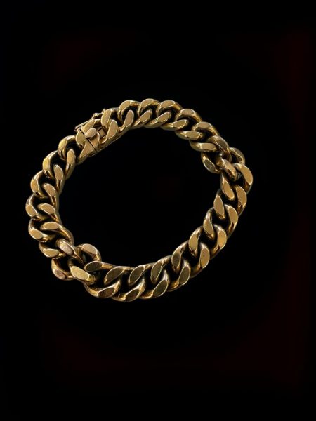 A 9ct Gold Curb-Link Bracelet.