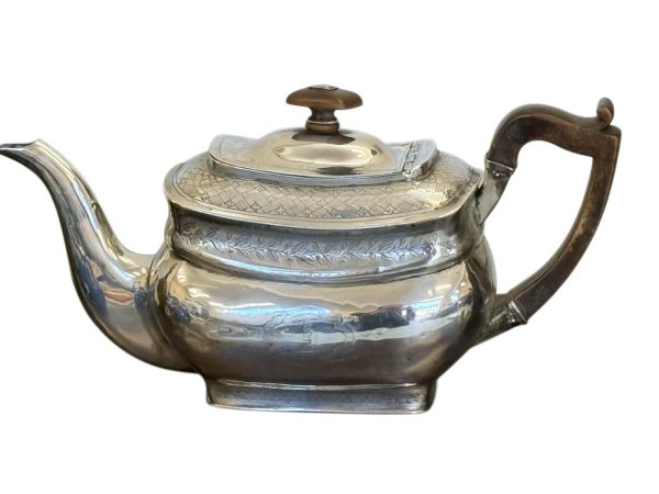A George III Silver Tea-Pot.