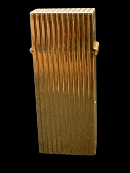 A 9ct Gold Cigarette Lighter.
