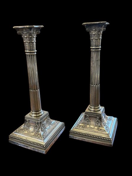 A Pair of Silver Candlesticks.